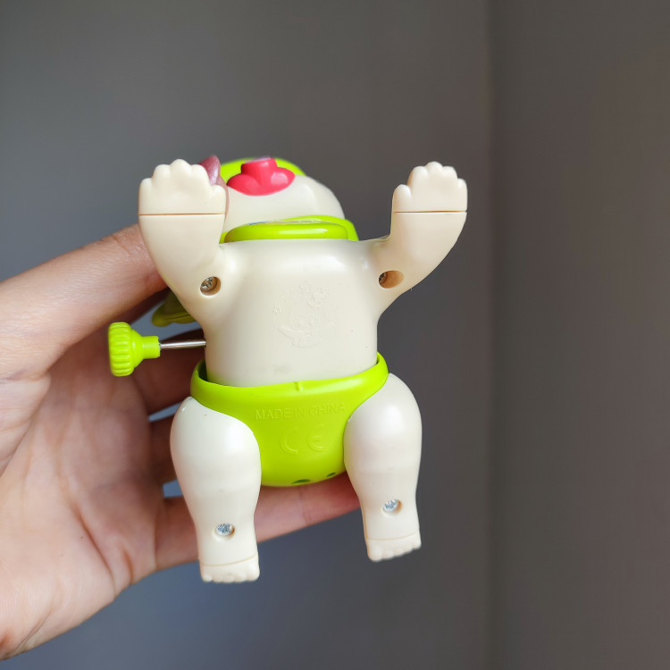 اسباب بازی کوکی نوزاد سوتکی رنگ سبز